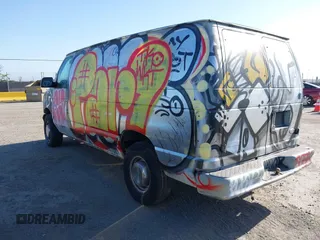 2002 Ford Econoline Cargo with VIN 1FTNE24L42HB67506, listed as a IAAI auction lot 42056517 with 197,394 mi miles and . Bid and sale history available at DreamBid. Image 3.