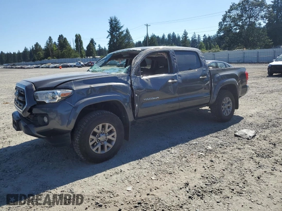 2017 Toyota Tacoma SR5 with VIN 3TMCZ5ANXHM052092, listed as a Copart auction lot 64898135 with 95,743 mi miles and Salvage title. Bid and sale history available at DreamBid. Image 1.