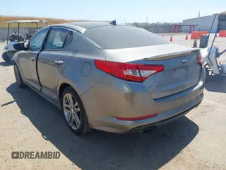 2013 Kia Optima SX with VIN 5XXGR4A61DG178390, listed as a IAAI auction lot 42212824 with 128,055 mi miles and . Bid and sale history available at DreamBid. Image 3.