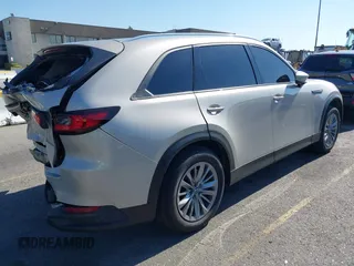 2024 Mazda CX-90 Preferred Plus with VIN JM3KKCHD2R1108548, listed as a IAAI auction lot 42214701 with 41,239 mi miles and . Bid and sale history available at DreamBid. Image 4.