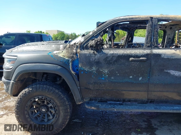 2022 Ram 1500 TRX with VIN 1C6SRFU99NN151639, listed as a IAAI auction lot 42145733 with Not provided miles and . Bid and sale history available at DreamBid. Image 6.