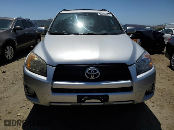 2010 Toyota RAV4 Sport with VIN JTMWF4DVXA5028981, listed as a Copart auction lot 60931165 with 214,075 mi miles and Salvage title. Bid and sale history available at DreamBid. Image 5.