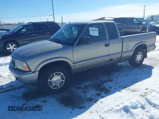 1999 GMC Sonoma SLS with VIN 1GTDT19X9X8531949, listed as a IAAI auction lot 41608606 with 127,664 mi miles. Bid and sale history available at carsss.com. Image 2.