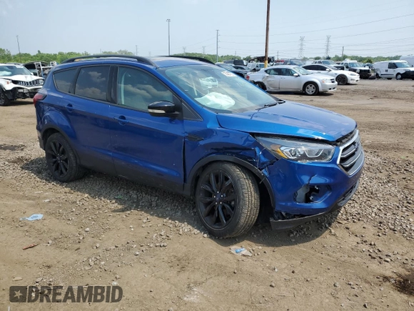 2019 Ford Escape Titanium z VIN 1FMCU9J99KUB39487, wystawiony jako Copart lot #60424765 z przebiegiem 43 094 mil mil oraz Szkoda całkowita • Salvage title. Historia ofert i sprzedaży dostępna na DreamBid. Obrazek 4.