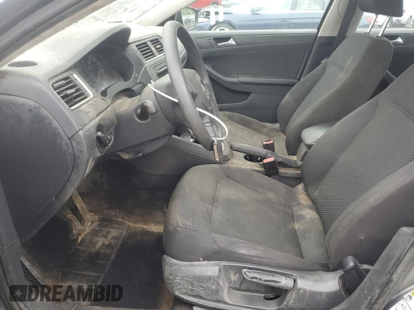 2013 Volkswagen Jetta S with VIN 3VW2K7AJ4DM318853, listed as a Copart auction lot 57597955 with 165,023 mi miles and Salvage title. Bid and sale history available at DreamBid. Image 7.