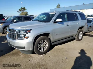 2020 Chevrolet Tahoe LT with VIN 1GNSKBKCXLR157872, listed as a Copart auction lot 79806594 with 129,729 mi miles and Salvage Title. Bid and sale history available at carsss.com. Image 1.