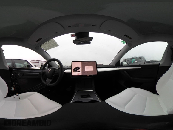 2025 Tesla Model Y Long Range with VIN 7SAYGDED8SA340082, listed as a IAAI auction lot 41915369 with 7,296 mi miles and . Bid and sale history available at DreamBid. Image 21.
