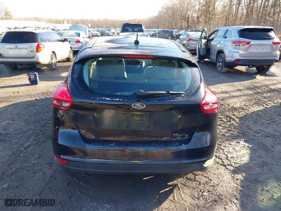 2015 Ford Focus SE with VIN 1FADP3K20FL213184, listed as a IAAI auction lot 41801065 with 151,824 mi miles. Bid and sale history available at carsss.com. Image 16.