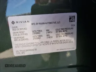 2024 Rivian R1S Adventure with VIN 7PDSGCBA5RN042135, listed as a Copart auction lot 42229865 with 107 mi miles and Salvage Title. Bid and sale history available at carsss.com. Image 14.
