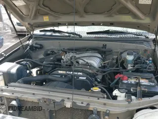 2002 Toyota Tundra z VIN 5TBJN32132S240701, wystawiony jako IAAI lot #42801109 z przebiegiem 176 062 mil mil oraz . Historia ofert i sprzedaży dostępna na DreamBid. Obrazek 12.