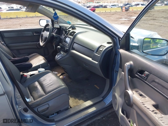 2009 Honda CR-V EX-L with VIN 5J6RE48799L065209, listed as a IAAI auction lot 41868398 with 111,385 mi miles. Bid and sale history available at carsss.com. Image 5.