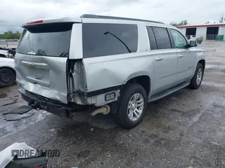 2016 Chevrolet Suburban LT z VIN 1GNSCHKCXGR111027, wystawiony jako IAAI lot #42399887 z przebiegiem 133 970 mil mil oraz . Historia ofert i sprzedaży dostępna na DreamBid. Obrazek 4.