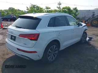 2021 Audi Q5 Premium Plus z VIN WA1BAAFYXM2050028, wystawiony jako IAAI lot #42479898 z przebiegiem 39 015 mil mil oraz . Historia ofert i sprzedaży dostępna na DreamBid. Obrazek 4.