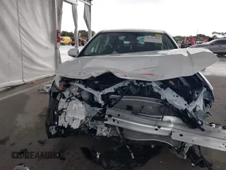 2025 Toyota Camry LE with VIN 4T1DAACK9SU112515, listed as a IAAI auction lot 41932562 with 587 mi miles and . Bid and sale history available at DreamBid. Image 12.