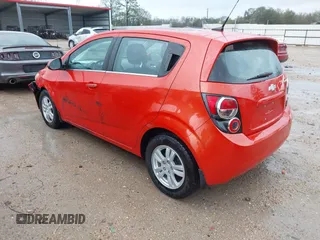 2013 Chevrolet Sonic LT with VIN 1G1JC6SHXD4139822, listed as a IAAI auction lot 41672289 with 87,899 mi miles. Bid and sale history available at carsss.com. Image 3.