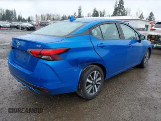 2021 Nissan Versa SV with VIN 3N1CN8EV2ML830282, listed as a IAAI auction lot 41913640 with 76,823 mi miles. Bid and sale history available at carsss.com. Image 4.