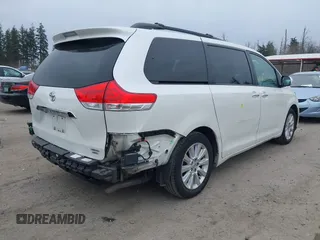 2014 Toyota Sienna Ltd with VIN 5TDDK3DC5ES073175, listed as a IAAI auction lot 41818572 with 107,971 mi miles. Bid and sale history available at carsss.com. Image 4.