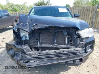 2016 Toyota Tacoma SR5 with VIN 5TFAX5GN4GX060296, listed as a IAAI auction lot 42158554 with 219,859 mi miles and . Bid and sale history available at DreamBid. Image 12.