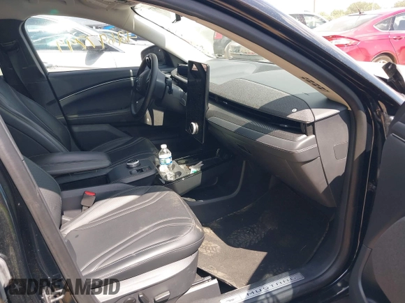 2023 Ford Mustang Mach-E Premium with VIN 3FMTK3SU2PMA83720, listed as a IAAI auction lot 42697799 with 38,277 mi miles and . Bid and sale history available at DreamBid. Image 5.