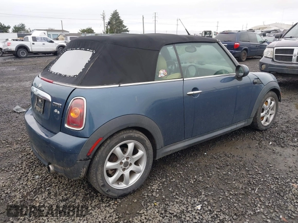 2009 MINI Convertible with VIN WMWMR33519TU96578, listed as a IAAI auction lot 41439278 with 100,070 mi miles and . Bid and sale history available at DreamBid. Image 4.