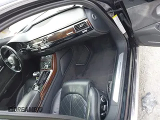 2015 Audi A8 L 4.0T with VIN WAU32AFD7FN006233, listed as a IAAI auction lot 41353034 with 119,693 mi miles. Bid and sale history available at carsss.com. Image 5.