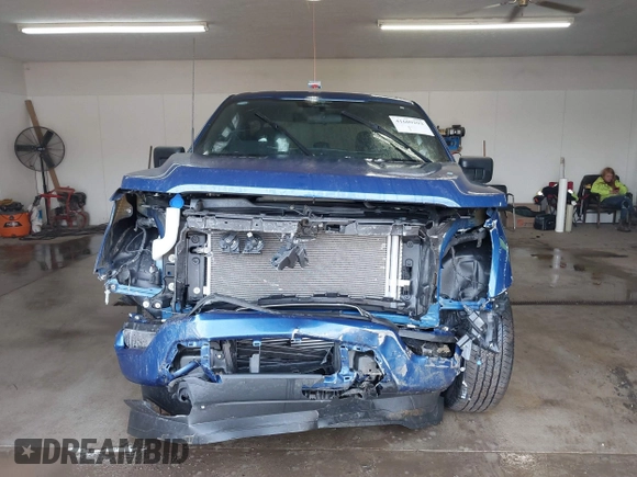 2023 Ford F-150 XL with VIN 1FTEW1EP8PKG08718, listed as a IAAI auction lot 41609293 with 26,414 mi miles. Bid and sale history available at carsss.com. Image 12.