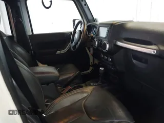 2016 Jeep Wrangler Unlimited Rubicon with VIN 1C4HJWFG4GL127379, listed as a IAAI auction lot 41732688 with 110,193 mi miles. Bid and sale history available at carsss.com. Image 5.
