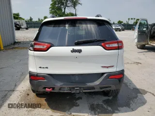 2015 Jeep Cherokee Trailhawk with VIN 1C4PJMBS8FW717950, listed as a Copart auction lot 60321625 with 155,210 mi miles and Salvage title. Bid and sale history available at DreamBid. Image 6.