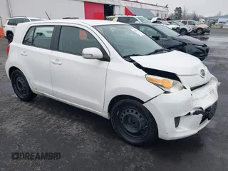 2009 Scion xD with VIN JTKKU10489J037576, listed as a IAAI auction lot 41279872 with 146,500 mi miles. Bid and sale history available at carsss.com. Image 1.