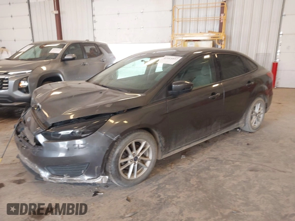 2015 Ford Focus SE with VIN 1FADP3F23FL216154, listed as a IAAI auction lot 42411857 with 127,612 mi miles and . Bid and sale history available at DreamBid. Image 2.