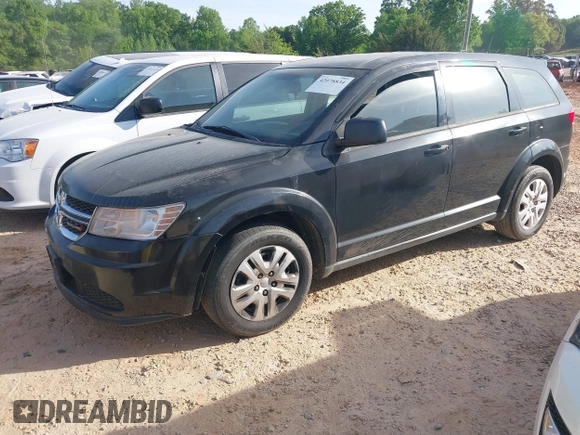 2014 Dodge Journey SE with VIN 3C4PDCAB7ET170340, listed as a IAAI auction lot 42078834 with 215,084 mi miles and . Bid and sale history available at carsss.com. Image 2.