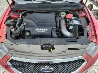 2015 Ford Taurus SHO with VIN 1FAHP2KTXFG130133, listed as a Copart auction lot 60019955 with 92,527 mi miles and Salvage title. Bid and sale history available at DreamBid. Image 11.