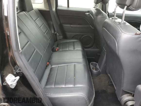 2016 Jeep Patriot High Altitude with VIN 1C4NJRFB1GD523644, listed as a Copart auction lot 58668995 with 77,179 mi miles and Salvage title. Bid and sale history available at DreamBid. Image 11.