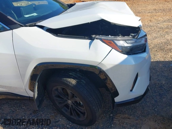 2023 Toyota RAV4 Hybrid XSE with VIN 2T3E6RFV1PW038080, listed as a IAAI auction lot 42518107 with 14,430 mi miles and . Bid and sale history available at DreamBid. Image 17.