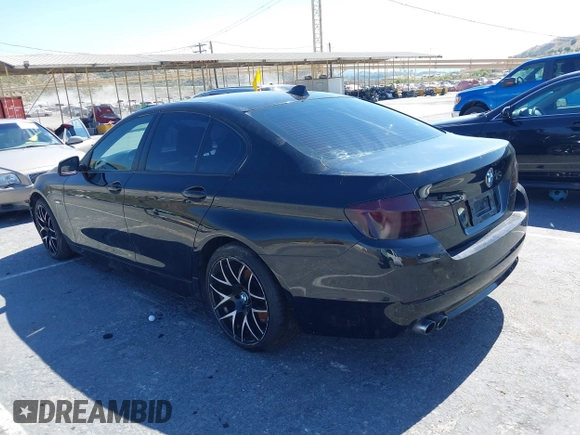 2013 BMW 5 Series 528i with VIN WBAXG5C50DDY35638, listed as a IAAI auction lot 39657715 with 139,765 mi miles and . Bid and sale history available at carsss.com. Image 3.