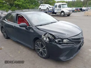 2018 Toyota Camry LE z VIN JTNB11HK5J3051104, wystawiony jako IAAI lot #42311558 z przebiegiem 135 438 mil mil oraz . Historia ofert i sprzedaży dostępna na DreamBid. Obrazek 1.