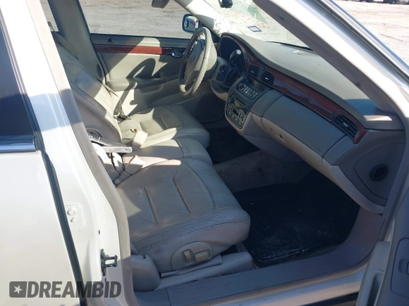2002 Cadillac DeVille z VIN 1G6KD54Y92U130111, wystawiony jako IAAI lot #42439252 z przebiegiem 194 669 mil mil oraz . Historia ofert i sprzedaży dostępna na DreamBid. Obrazek 5.