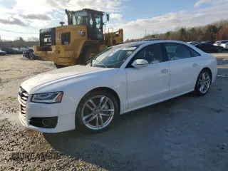 2016 Audi A8 L 4.0T Sport with VIN WAU43AFD2GN010239, listed as a Copart auction lot 84002294 with 139,364 mi miles and Salvage Title. Bid and sale history available at carsss.com. Image 1.