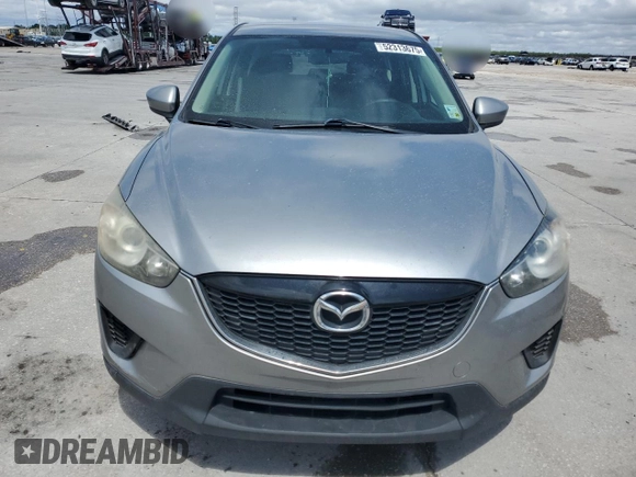 2014 Mazda CX-5 Sport with VIN JM3KE2BE1E0402185, listed as a Copart auction lot 52313675 with 140,398 mi miles and Salvage Title. Bid and sale history available at carsss.com. Image 5.
