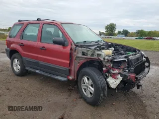2006 Ford Escape XLS with VIN 1FMYU92Z36KA30318, listed as a Copart auction lot 73215554 with 51,264 mi miles and Salvage Title. Bid and sale history available at carsss.com. Image 4.