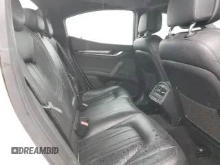 2016 Maserati Ghibli z VIN ZAM57XSA2G1175656, wystawiony jako Copart lot #44798125 z przebiegiem 105 496 mil mil oraz Szkody całkowita. Historia ofert i sprzedaży dostępna na DreamBid. Obrazek 10.