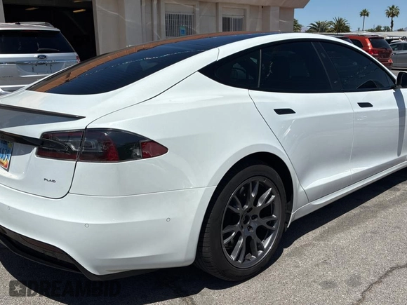 2021 Tesla Model S Plaid с VIN 5YJSA1E64MF447124, выставлен на аукционе Copart как лот 55833265 с пробегом 61 623 миль миль и Чистый • Clean title. История ставок и продаж доступна на DreamBid. Изображение 4.