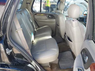 2005 GMC Envoy SLE z VIN 1GKDT13S952288760, wystawiony jako IAAI lot #41671656 z przebiegiem Nie podano mil oraz . Historia ofert i sprzedaży dostępna na DreamBid. Obrazek 8.
