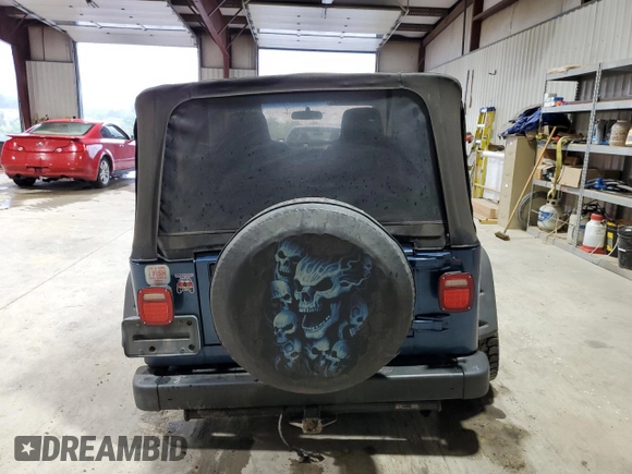 2003 Jeep Wrangler Sport with VIN 1J4FA49S23P344132, listed as a Copart auction lot 73292894 with 147,252 mi miles and Salvage Title. Bid and sale history available at carsss.com. Image 6.