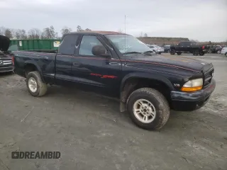 1999 Dodge Dakota SLT with VIN 1B7GG22X1XS235134, listed as a Copart auction lot 45508585 with 172,701 mi miles and Salvage Title. Bid and sale history available at carsss.com. Image 4.