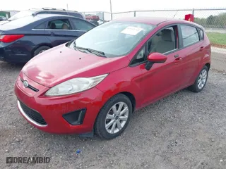 2011 Ford Fiesta SE with VIN 3FADP4EJ6BM128965, listed as a IAAI auction lot 41932743 with 123,057 mi miles. Bid and sale history available at carsss.com. Image 2.