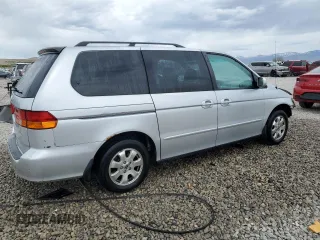 2004 Honda Odyssey EX-RES z VIN 5FNRL18804B121844, wystawiony jako Copart lot #53390135 z przebiegiem 284 065 mil mil oraz Szkoda całkowita • Salvage title. Historia ofert i sprzedaży dostępna na DreamBid. Obrazek 3.