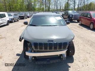 2023 Jeep Cherokee Altitude Lux with VIN 1C4PJMMB2PD113241, listed as a IAAI auction lot 42049059 with 46,944 mi miles. Bid and sale history available at carsss.com. Image 12.