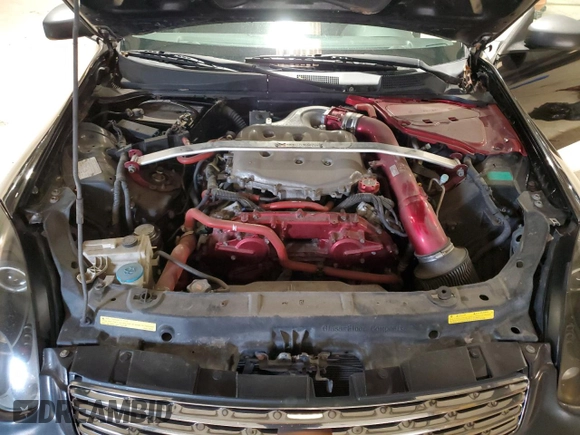 2004 Infiniti G35 w/Leather z VIN JNKCV54E04M801610, wystawiony jako Copart lot #45455485 z przebiegiem 162 732 mil mil oraz Szkoda całkowita • Salvage title. Historia ofert i sprzedaży dostępna na DreamBid. Obrazek 11.