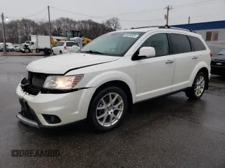 2014 Dodge Journey R/T with VIN 3C4PDDFG4ET199515, listed as a Copart auction lot 86354504 with 128,888 mi miles and Salvage title. Bid and sale history available at DreamBid. Image 1.